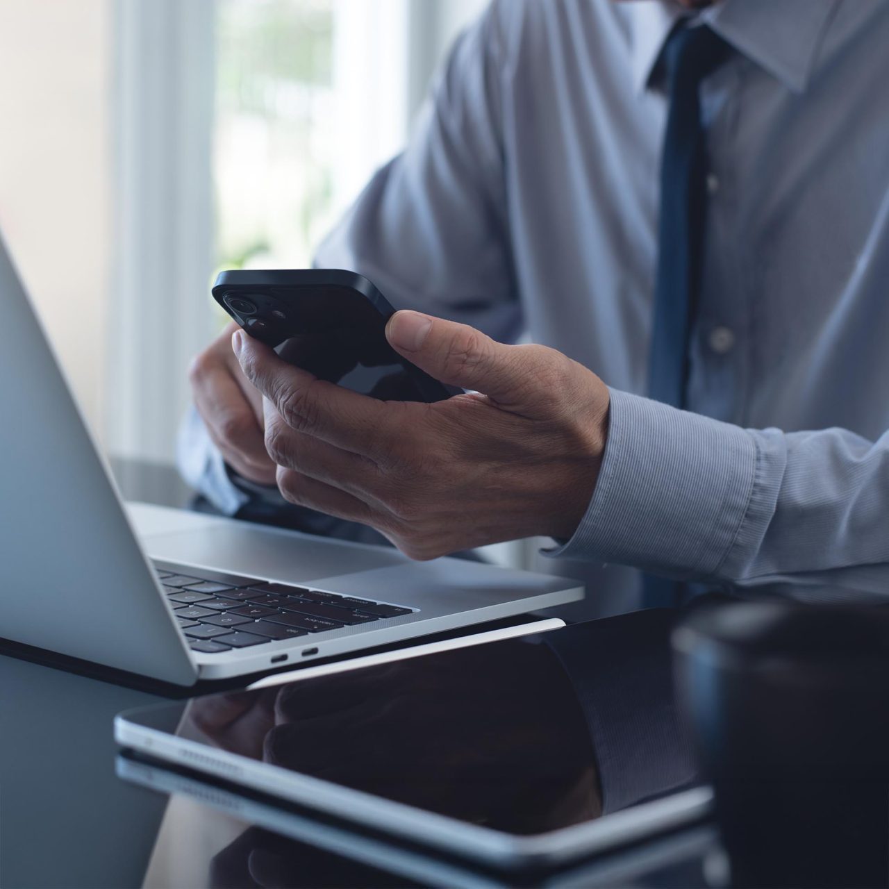 man using a smartphone square